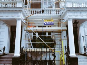 scaffold alarm sensor and signage protecting the property