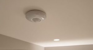 burglar alarm sensor installed on the ceiling in london