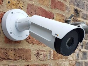 Axis bullet time lapse camera mounted on the building overlooking construction