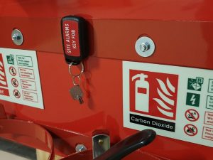 temporary site fire alarm reset key fitted on the trolley