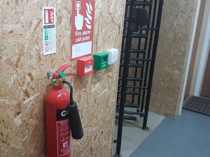 site fire alarm installation of Co2 Extinguisher and call point near the site turnstile